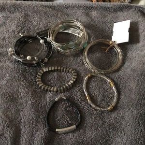 A LOT of bracelets.. all costume jewelry.